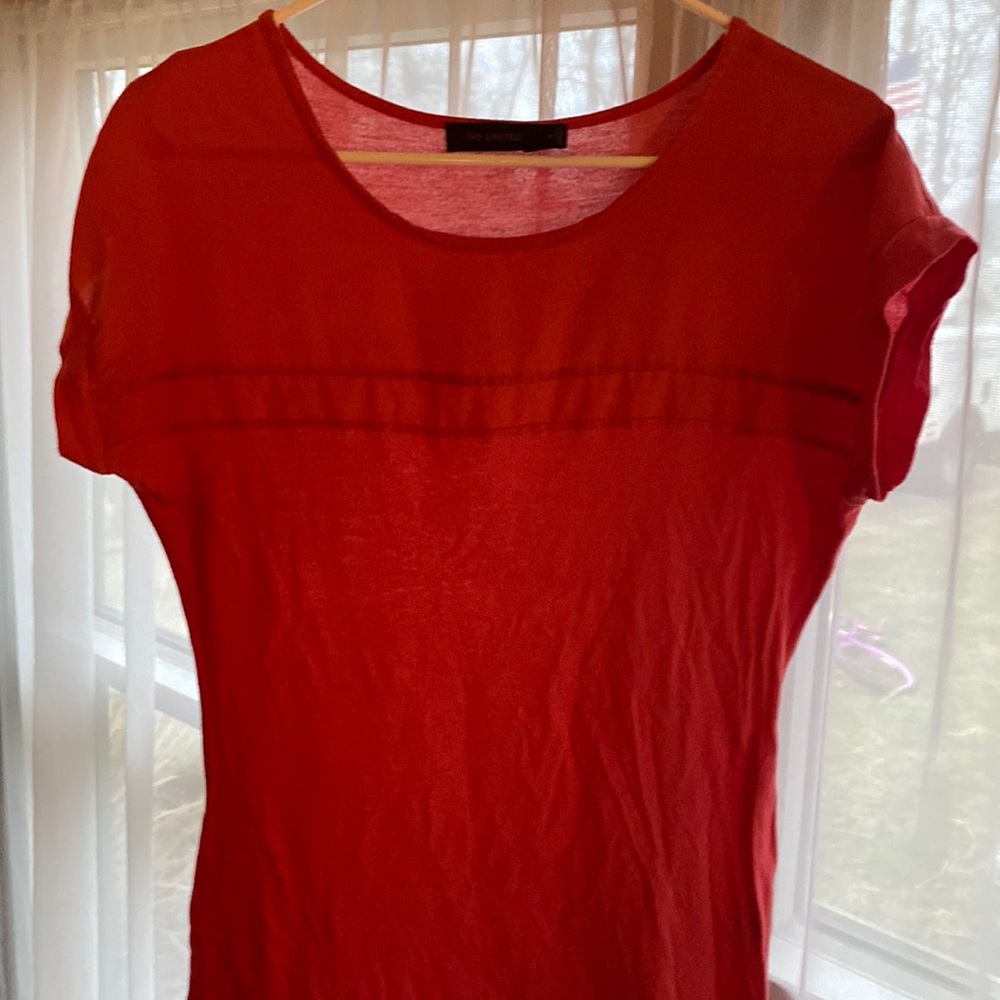 Coral top. Says medium, small fit